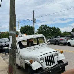 Front View Of Old US Mail Vehicle